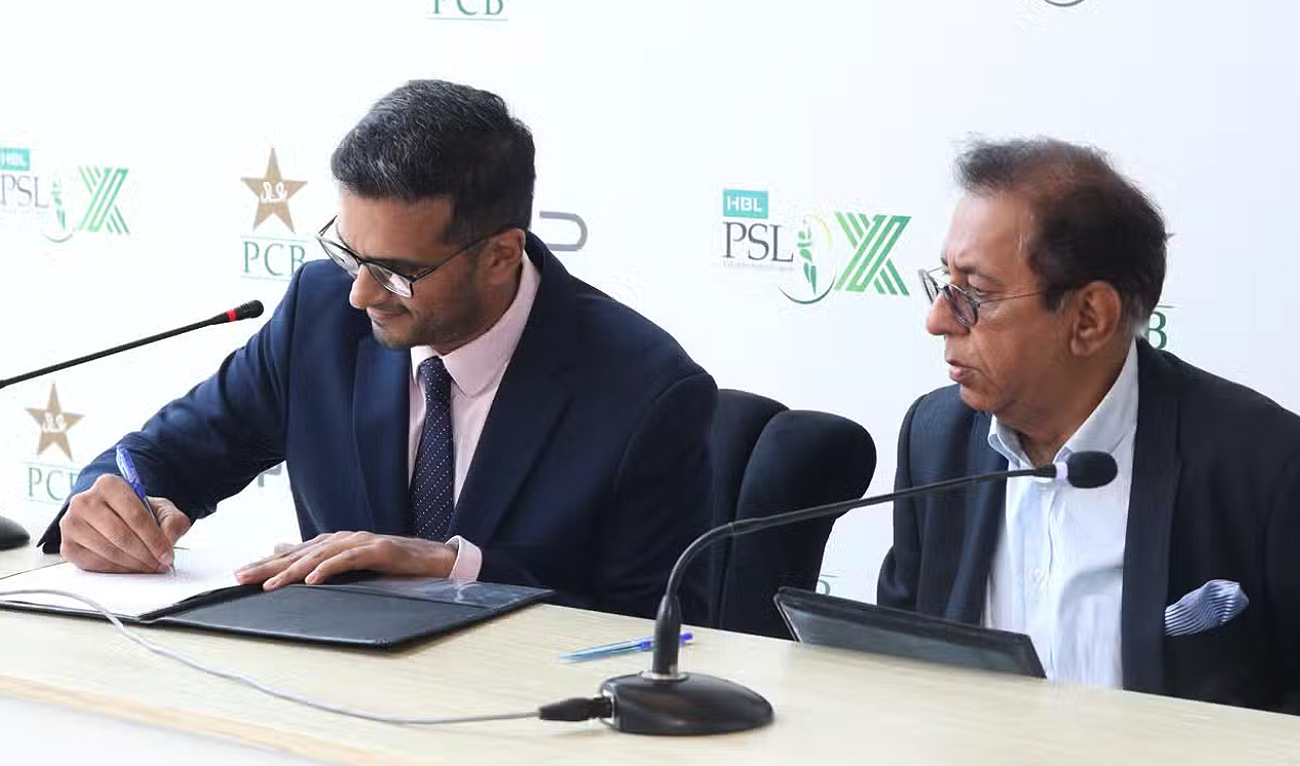 This handout photo, released on April 9, 2025, shows officials signing a partnership agreement with the 10th edition of Pakistan’s PSL cricket league as an official mobility partner, according to a press release. (Handout/BYD Pakistan)