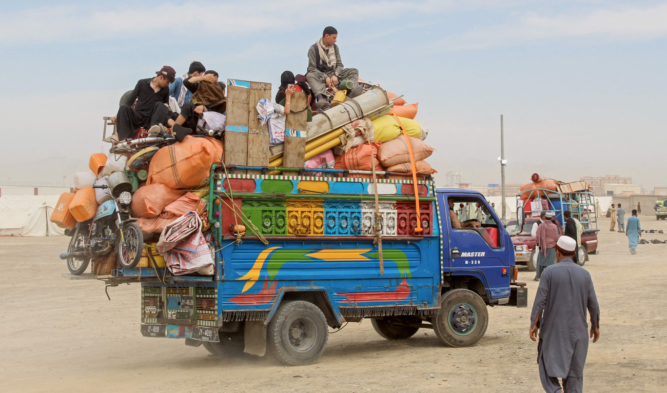 Afghan refugees due for deportation to Afghanistan arrive at a holding center to undergo biometric verification by the National Database and Registration Authority (NADRA), near the Pakistan-Afghanistan border in Chaman on April 8, 2025. (AFP)