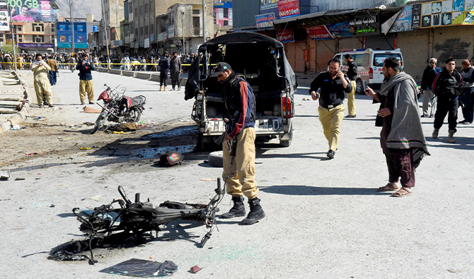 Security personnel inspect the site after militants detonated an explosive-laden motorbike along a road in Quetta on March 27, 2025. (AFP/File)