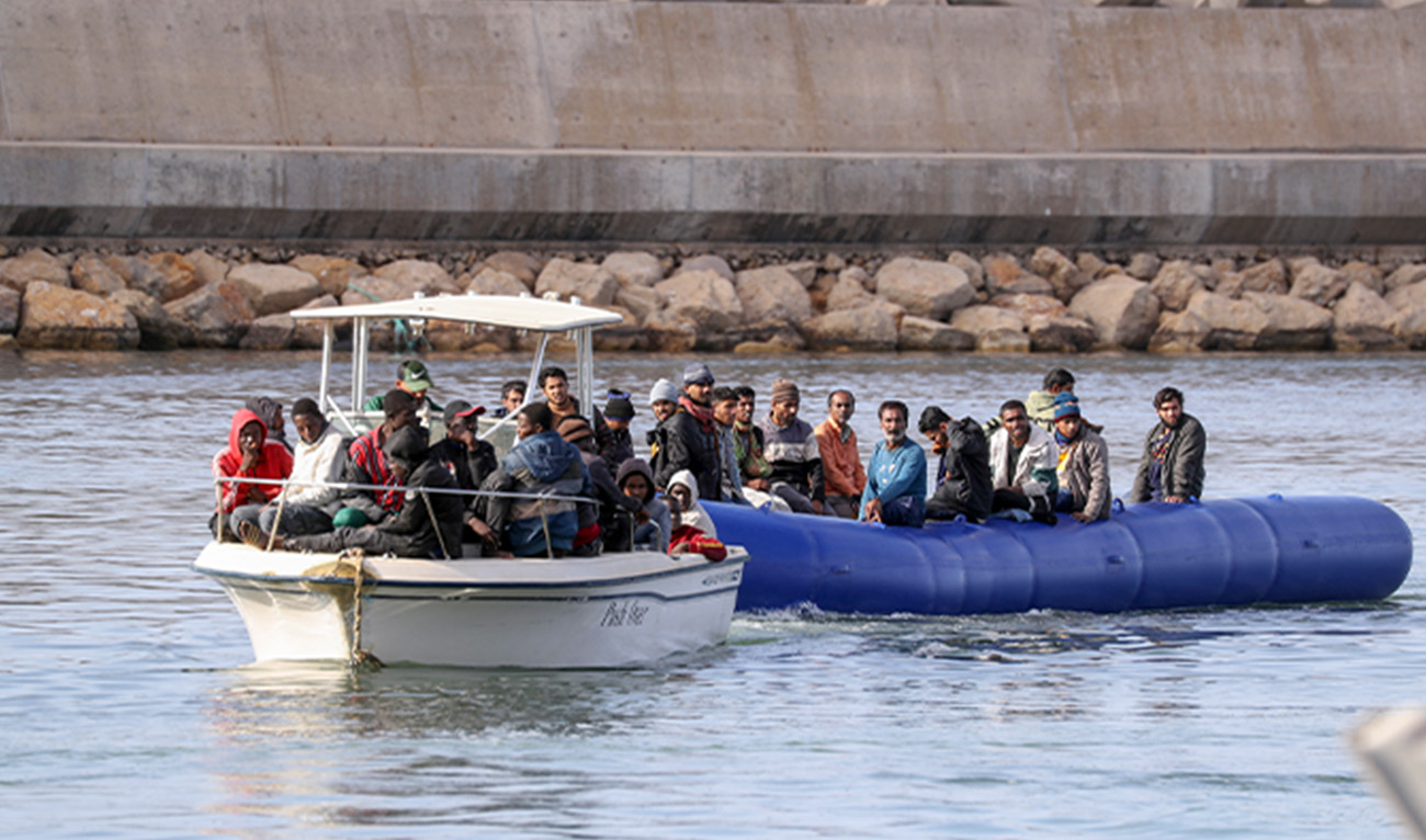 Boats transporting migrants of different nationalities enter a port in the Garabulli area following their rescue at sea by the Libyan Coast Guard, on April 25, 2023. (AFP/File)