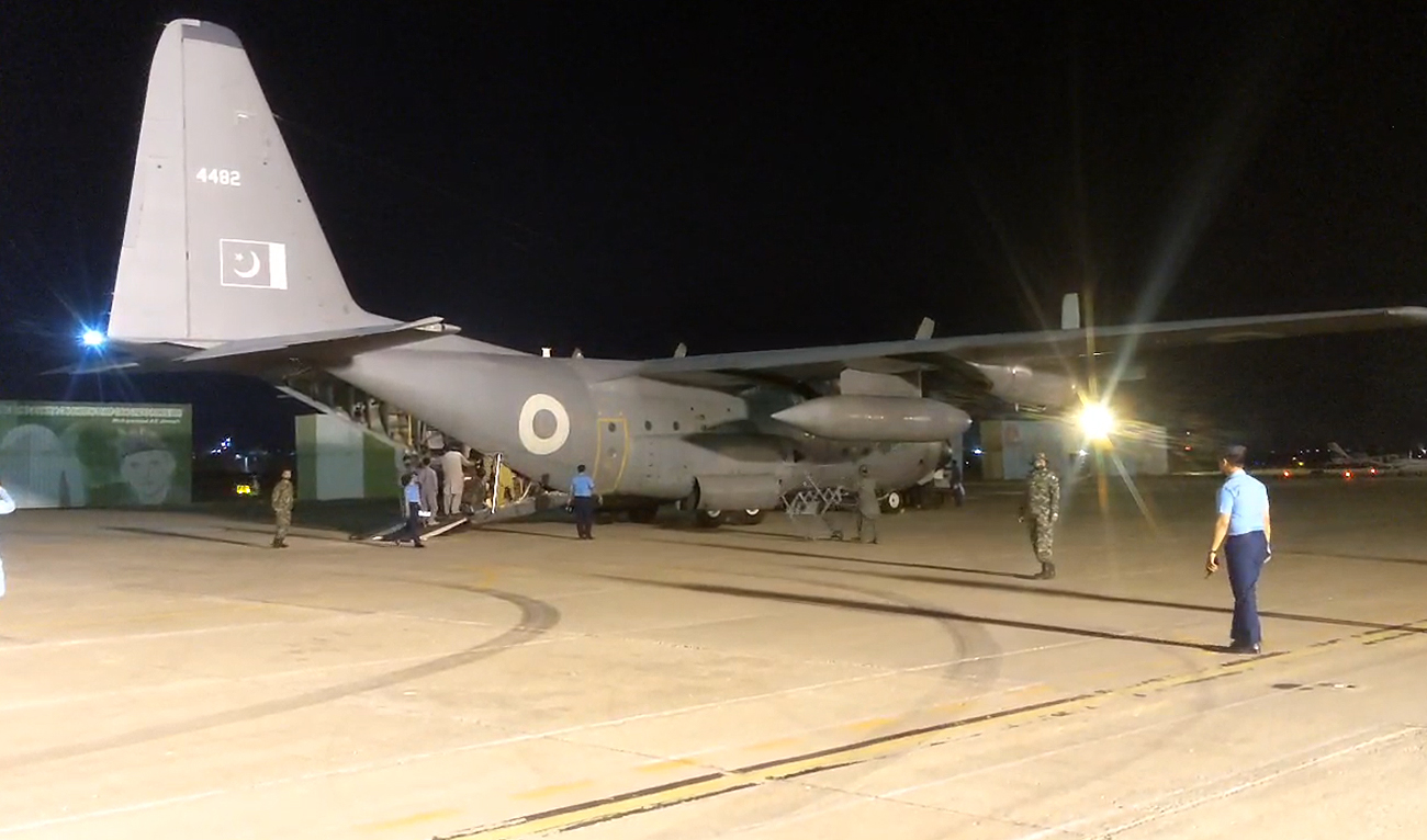 In this file photo, taken on August 23, 2024, a C-130 aircraft, carrying bodies of 28 Pakistani pilgrims killed in Iran bus crash, lands at the airport in Jacobabad, Pakistan. (Photo courtesy: PMO/File)