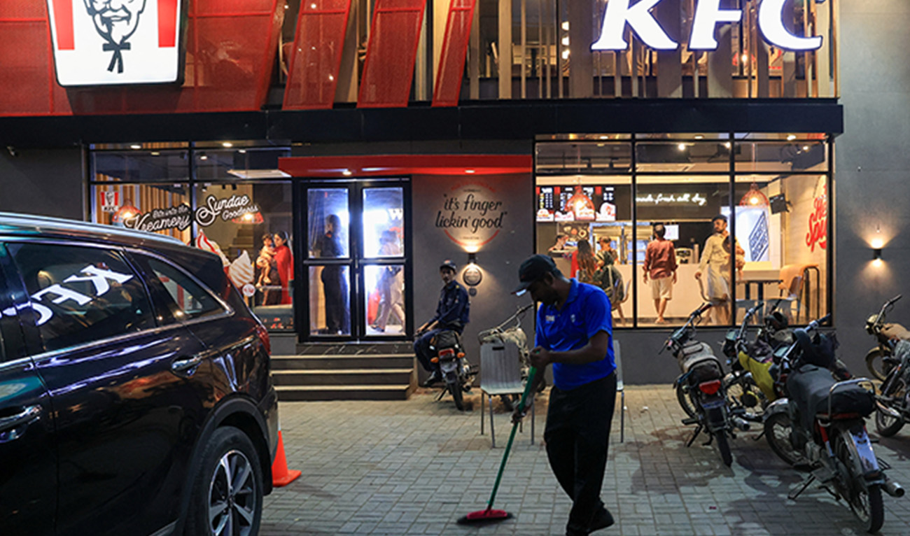 A worker clears the floor at a KFC fast food outlet, which was attacked and vandalised during an anti-Israel protest last week, in Karachi, Pakistan April 17, 2025. (Reuters)