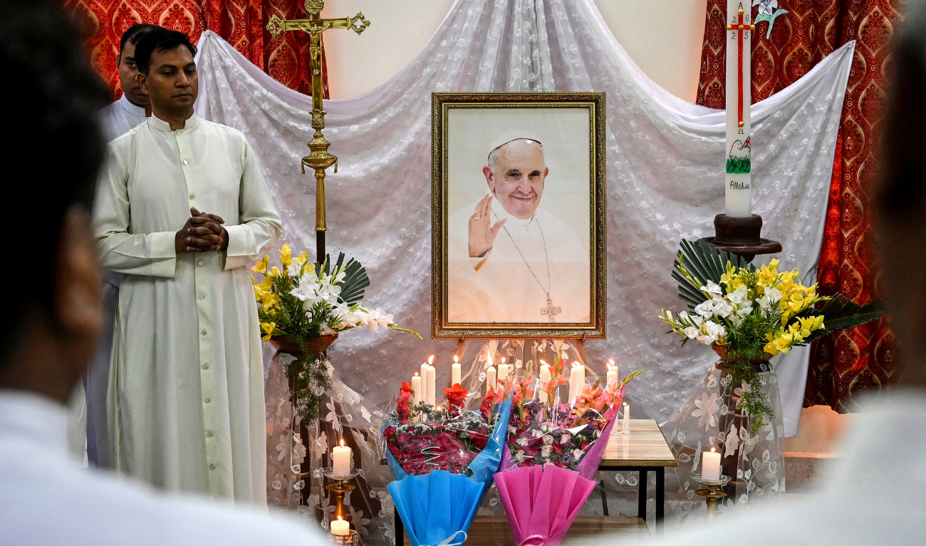 Christians attend a mass to honour late Pope Francis at the Sacred Heart Cathedral in Lahore on April 22, 2025, a day after his death. (AFP)