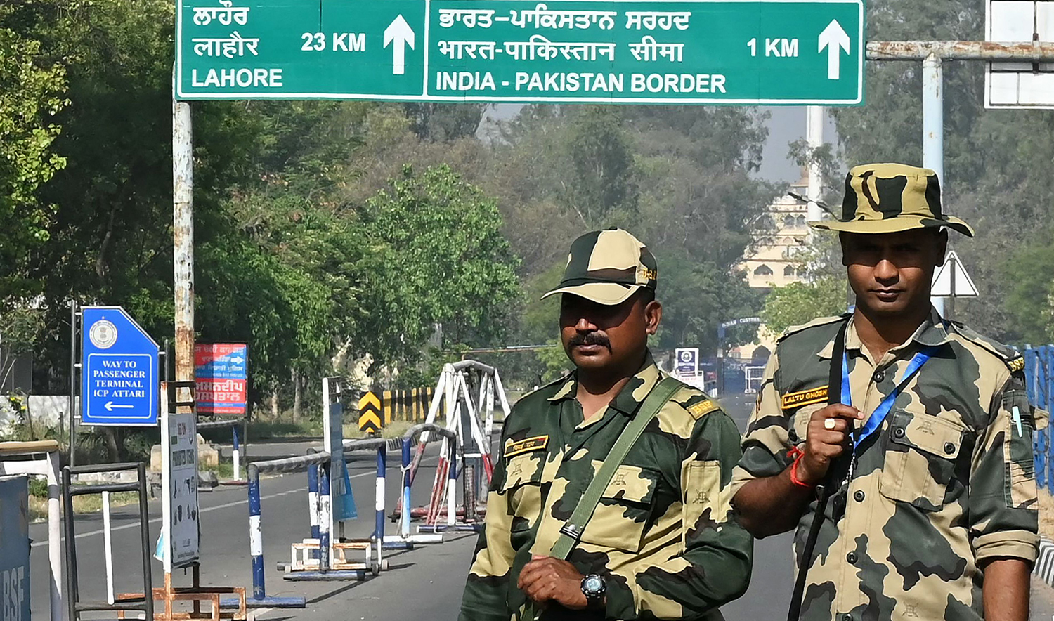 Indian Border Security Force (BSF) soldiers stand guard at the entrance of the India-Pakistan Wagah border post, about 35kms from Amritsar on April 24, 2025. (AFP)
