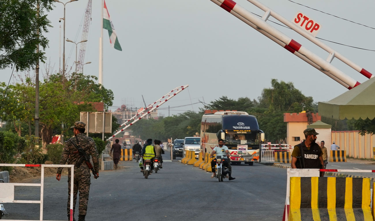 Pakistan’s paramilitary soldiers stand guard at a checkpoint near Wagah, a joint border crossing point between the Pakistan and India border, on April 24, 2025. (AP)