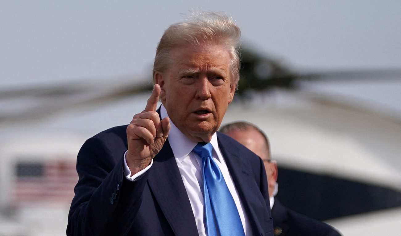 US President Donald Trump gestures as he walks to board Air Force One to depart for Rome, Italy, to attend Pope Francis’ funeral, at Joint Base Andrews in Maryland, US, on April 25, 2025. (REUTERS)