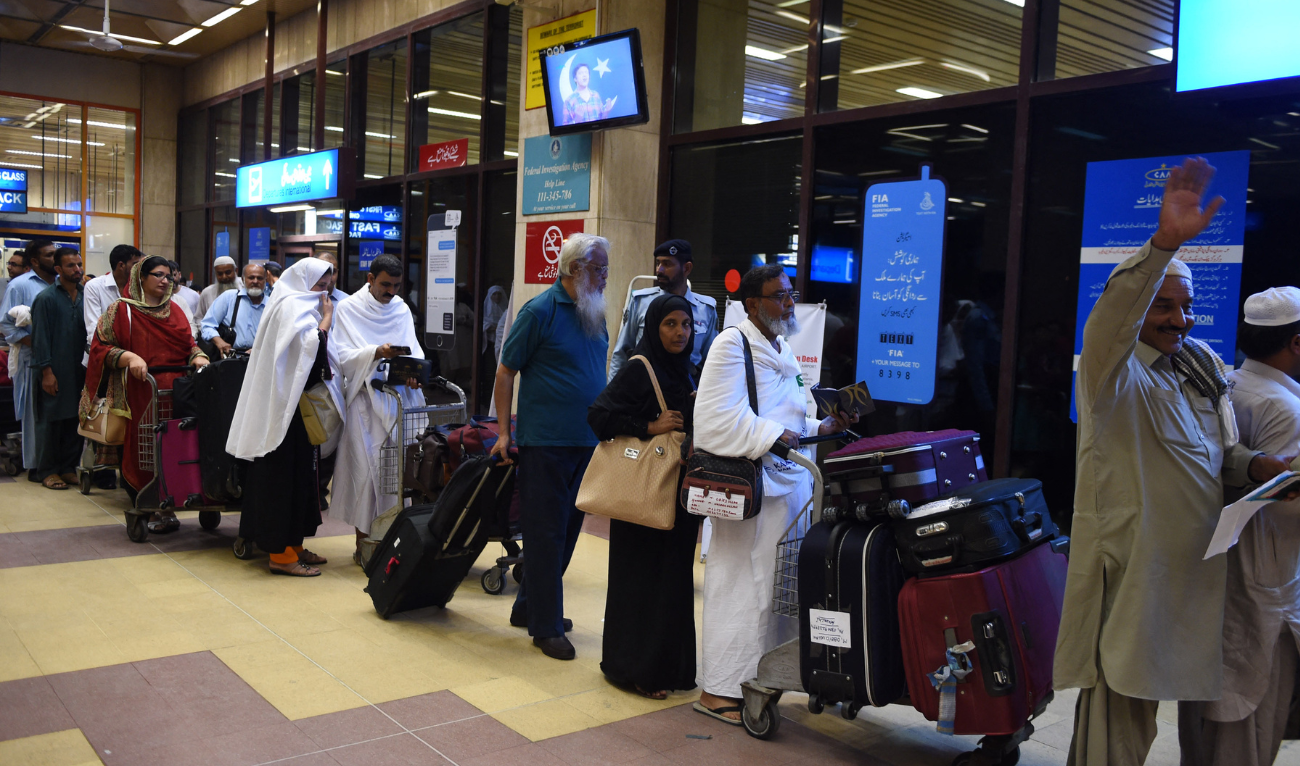 Pakistani hajj pilgrims queue to check-in at an airport terminal for the first hajj flight to Saudi Arabia, in Karachi on late August 15, 2015. (AFP/ file)