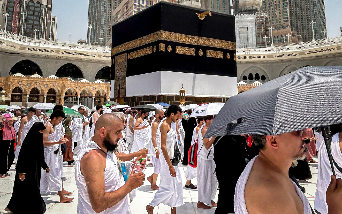 Muslim worshippers walk around the Kaaba, Islam's holiest shrine, at the Grand Mosque in Saudi Arabia's holy city of Makkah on June 13, 2024. (AFP/File)