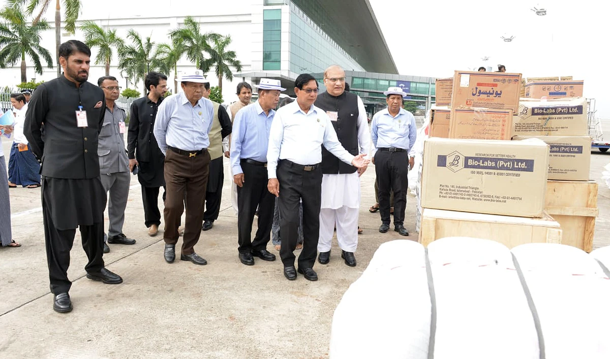 Officials inspect second relief consignment by Pakistan at the Yangon International Airport in Yangon on April 6, 2025. (National Disaster Management Authority)