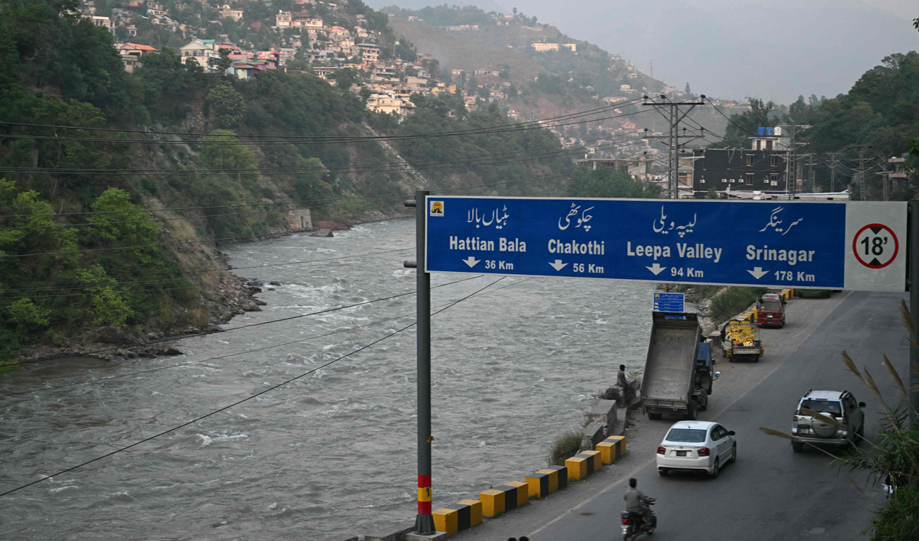 Kashmiri commuters ride alongside a Jhelum river in Muzaffarabad, the capital of Pakistan control Kashmir on April 30, 2025, following the Pakistan and India ongoing border tensions over Kashmir tourist attack. (AFP)