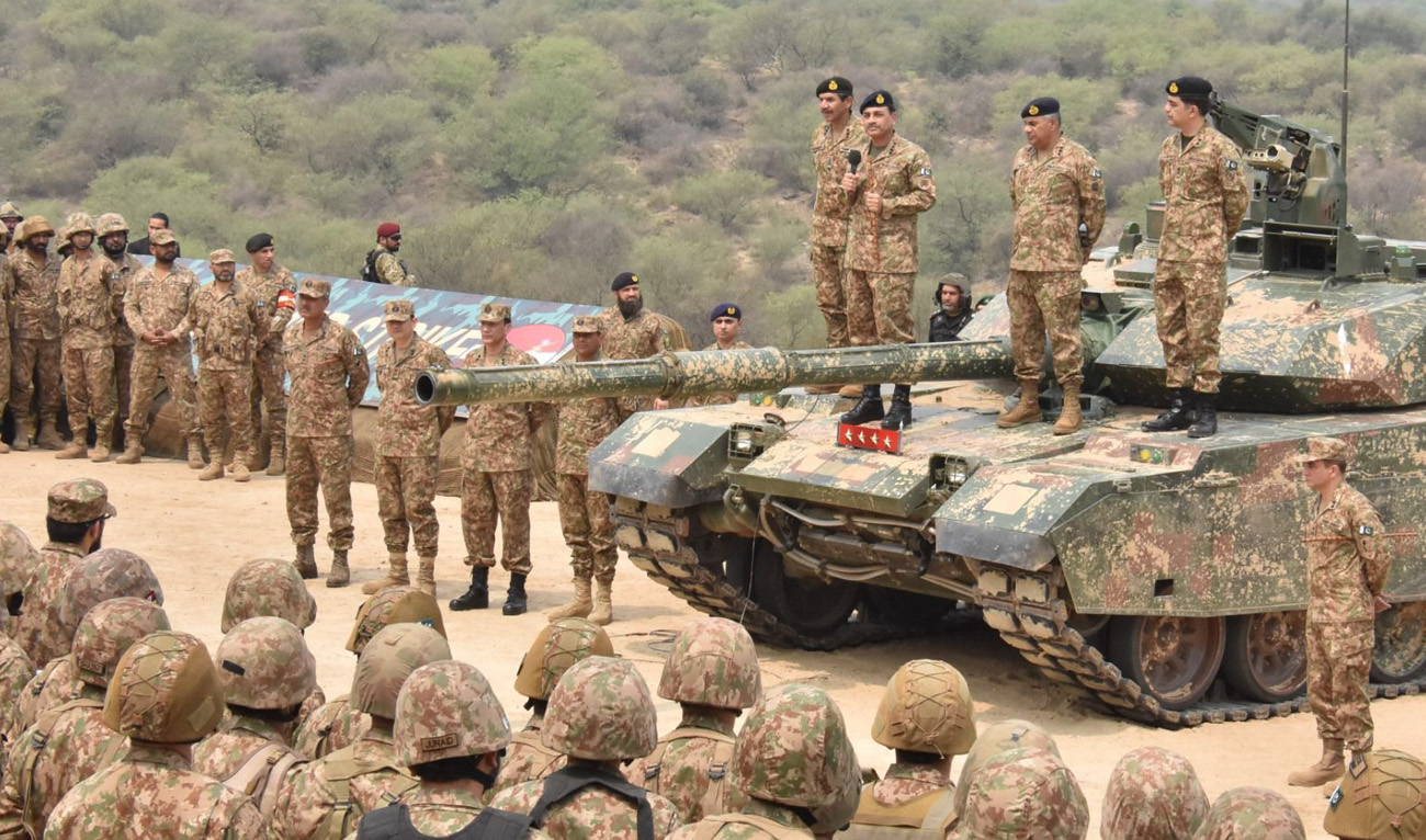 This handout photo, taken and released by the Inter-Services Public Relations (ISPR) on May 1, 2025, shows Pakistan’s Army Chief General Asim Munir speaking during the “Exercise Hammer Strike,” a high-intensity field training exercise conducted by Pakistan Army, at the Tilla Field Firing Ranges (TFFR) in Jhelum, Punjab. (Handout/ISPR)