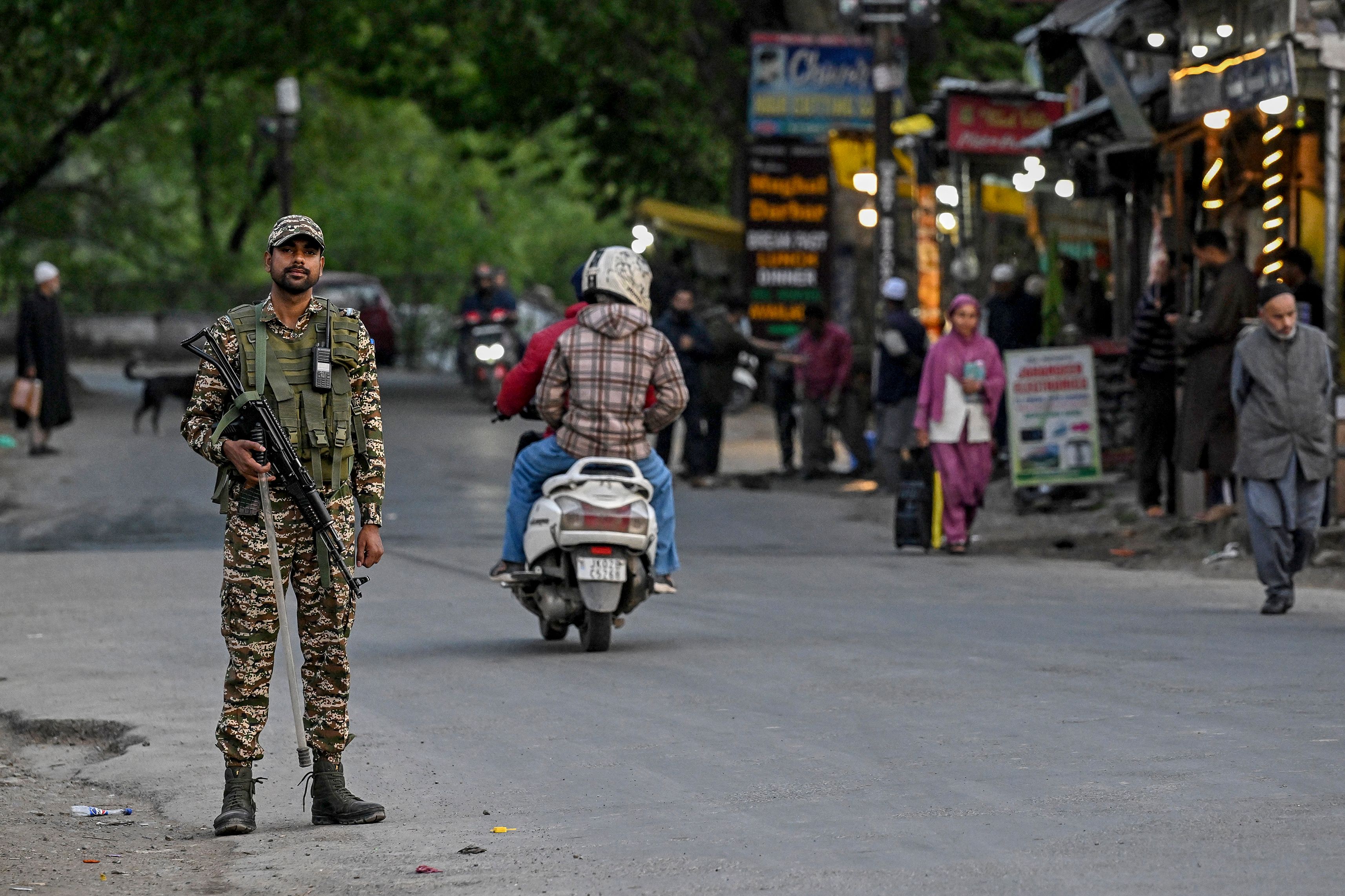 An Indian paramilitary personnel stands guard near Pahalgam, south of Srinagar, on April 22, 2025, following an attack by gunmen in Indian-administered Kashmir. (AFP/File)