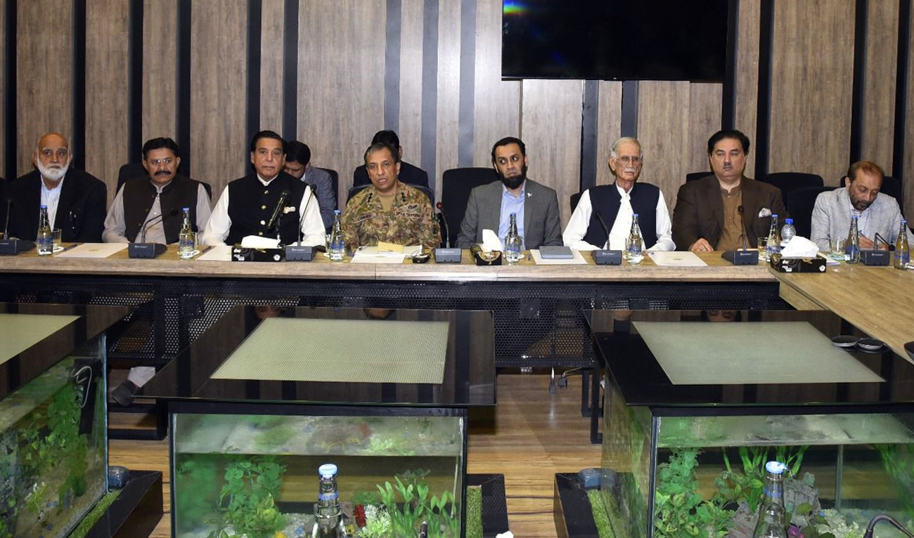 Pakistan’s Information Minister Attaullah Tarar (fourth right) and military spokesman Lt. Gen. Ahmed Sharif Chaudhry (fourth left) attends a meeting with political leaders on national security affairs in Islamabad on May 4, 2025. (Govt. of Pakistan)