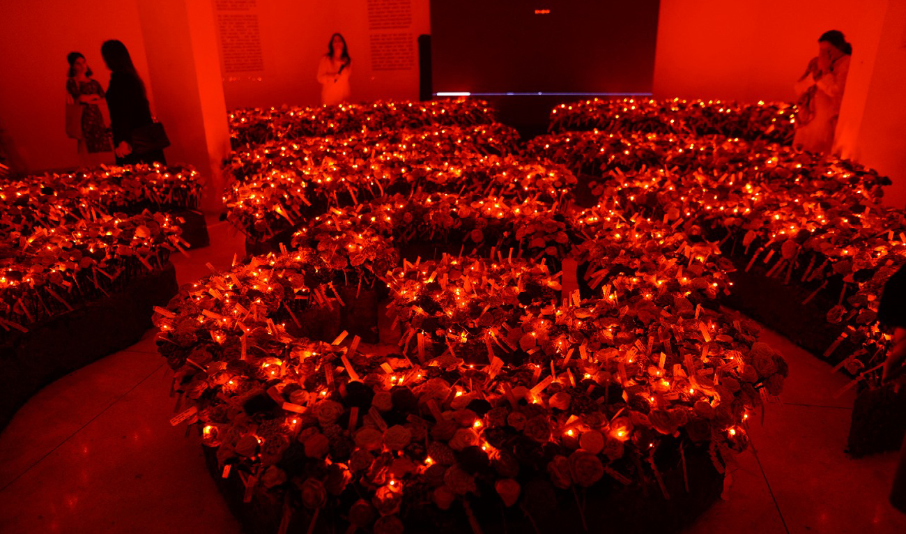 This handout photo, released by Roses of Humanity on May 4, 2025, shows an art installation features thousands of fabric roses, to honor children killed in Israeli strikes on Gaza, at the Al-Hamra Arts Council in Lahore on May 2, 2025. (Photo courtesy: Handout/Lotus)