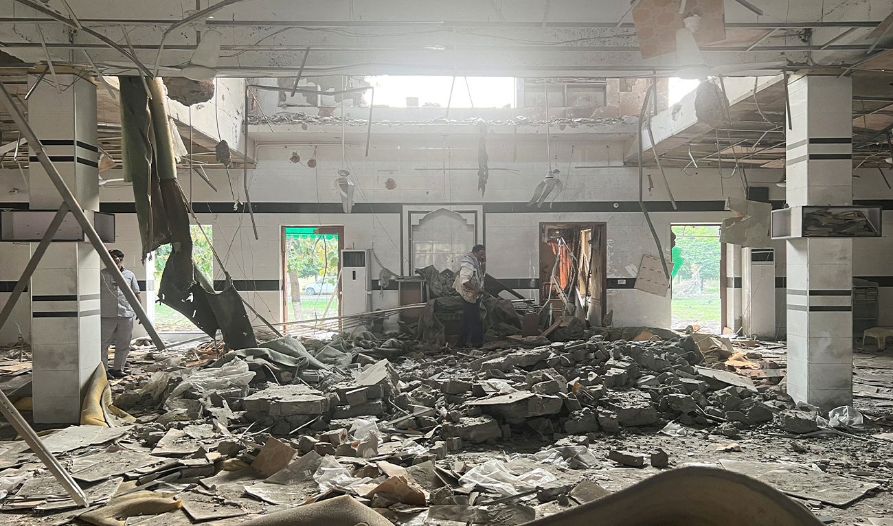 A man walks inside a mosque after it was hit by an Indian strike, in Muridke near Lahore, Pakistan, on May 7, 2025. (REUTERS/File)
