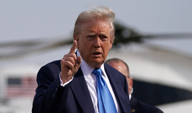 US President Donald Trump gestures as he walks to board Air Force One to depart for Rome, Italy, to attend Pope Francis’ funeral, at Joint Base Andrews in Maryland, US, on April 25, 2025. (REUTERS)