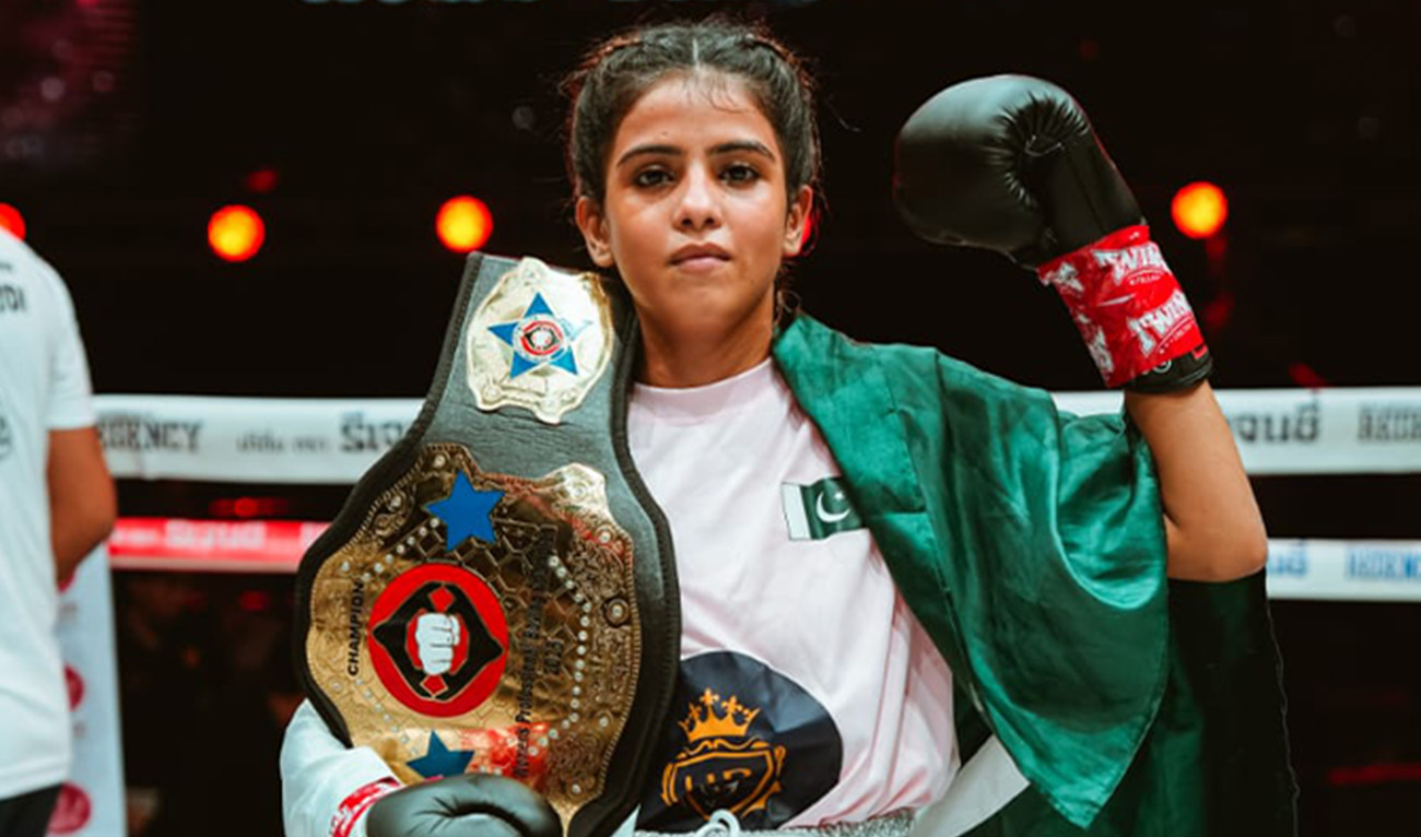 Boxer Aliya Soomro holds her belt after winning against Thailand's Suthida Ganyanooch in the first round of “The Fighter: World Boxing” match in Bangkok on May 3. (Aliya Soomro Boxer/X)