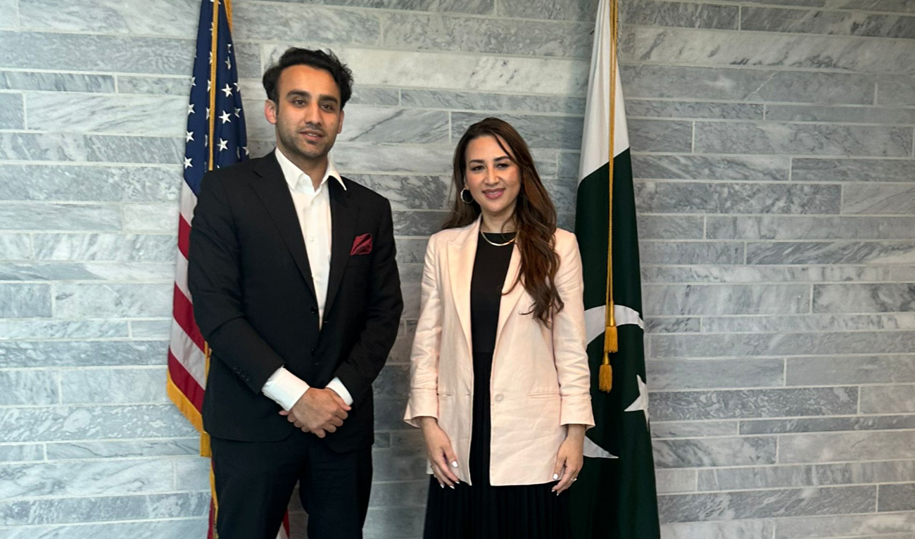 In this handout photo, released by Pakistan’s Finance Ministry on May 15, 2025, Pakistan Crypto Council CEO Bilal bin Saqib gestures with the Acting US Ambassador Natalie Baker during a meeting at the US Embassy in Islamabad. (Photo courtesy: Handout/Finance Ministry)