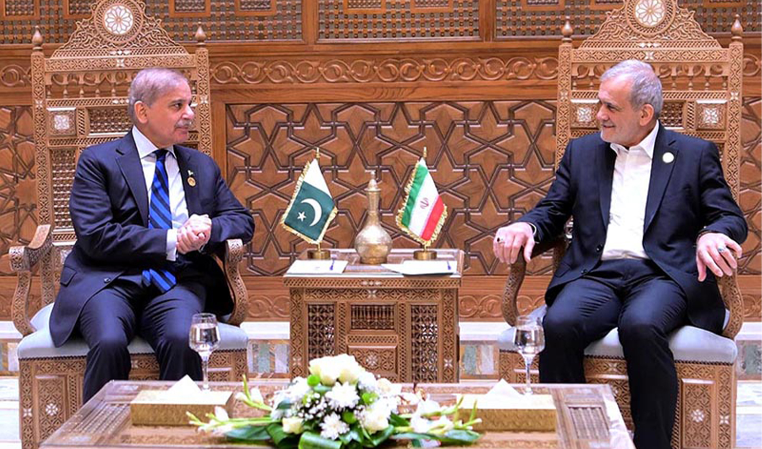 Pakistan Prime Minister Shehbaz Sharif meets Iranian President, Masoud Pezeshkian, on the sidelines of the 11th D-8 Summit in Cairo, Egypt, on December 19, 2024. (APP/File)