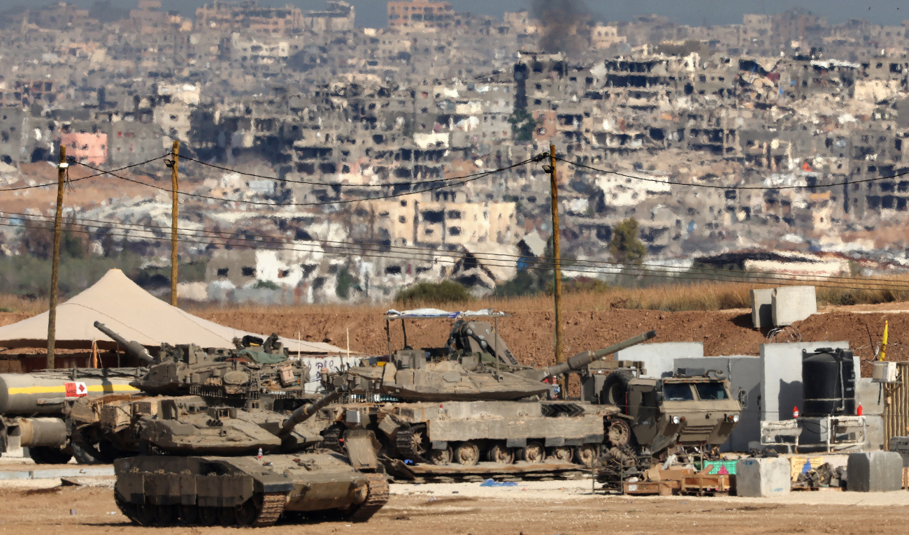 Israeli troops deploy at a position by Israel's border with the Gaza Strip on May 20, 2025. (AFP)