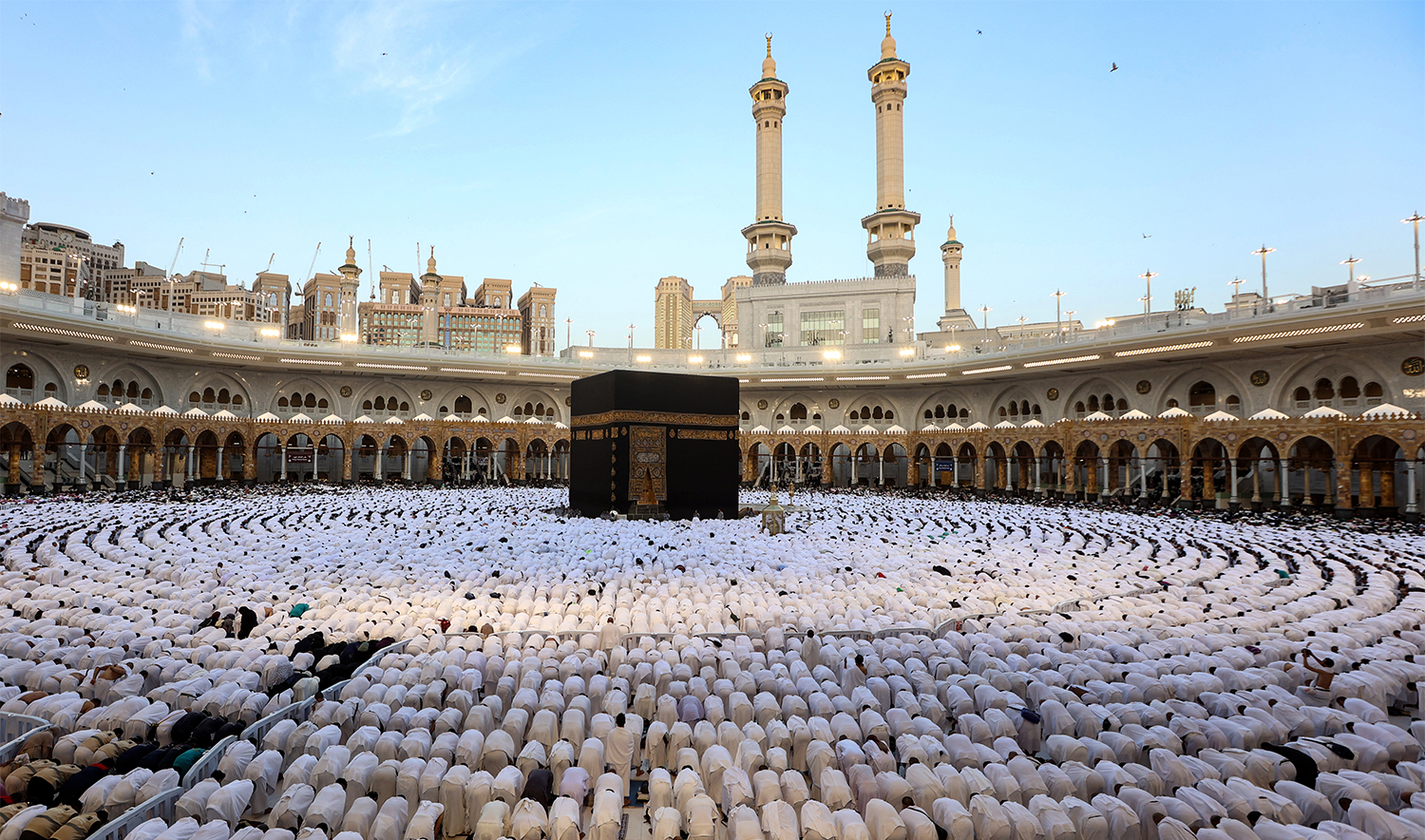 Muslims perform the morning prayer around the Kaaba at the Grand Mosque in Saudi Arabia's holy city of Makkah in March 30, 2025. (AFP/File)