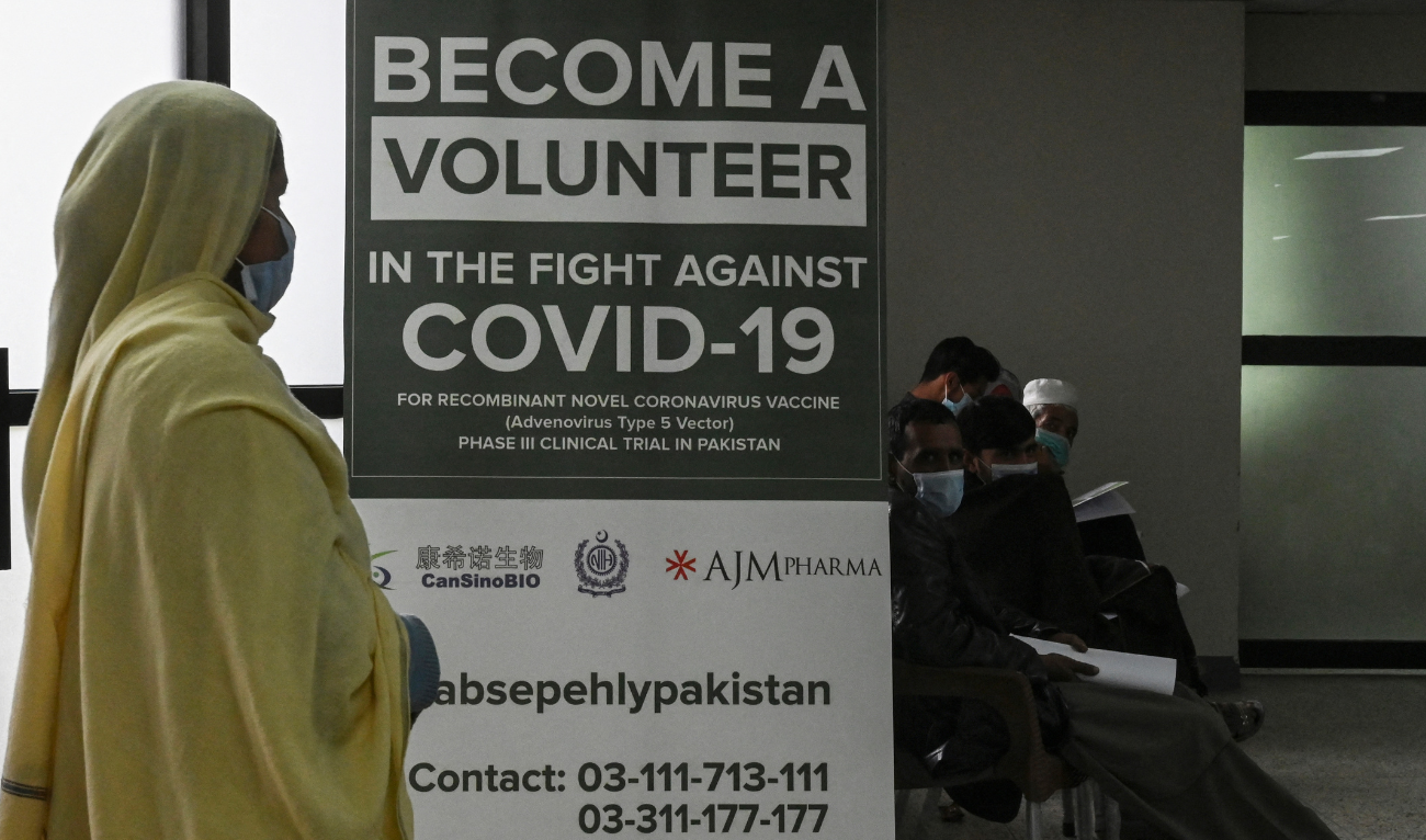 In this picture taken on November 25, 2020 volunteers wait to be administered the new Chinese-made vaccine for the Covid-19 coronavirus, the first ever Phase 3 clinical trial for any vaccine in Pakistan, at a hospital in Islamabad. (AFP/ file)