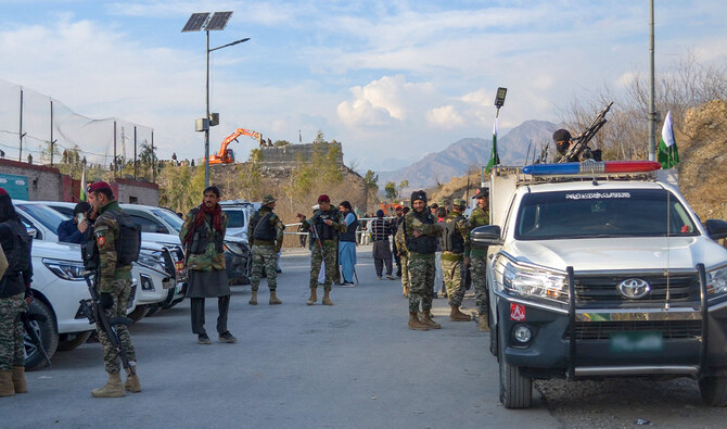 Frontier Constabulary and army personnel gather near the ambushed region in district Kurram, northwest Pakistan, on January 17, 2025. (AFP/File)