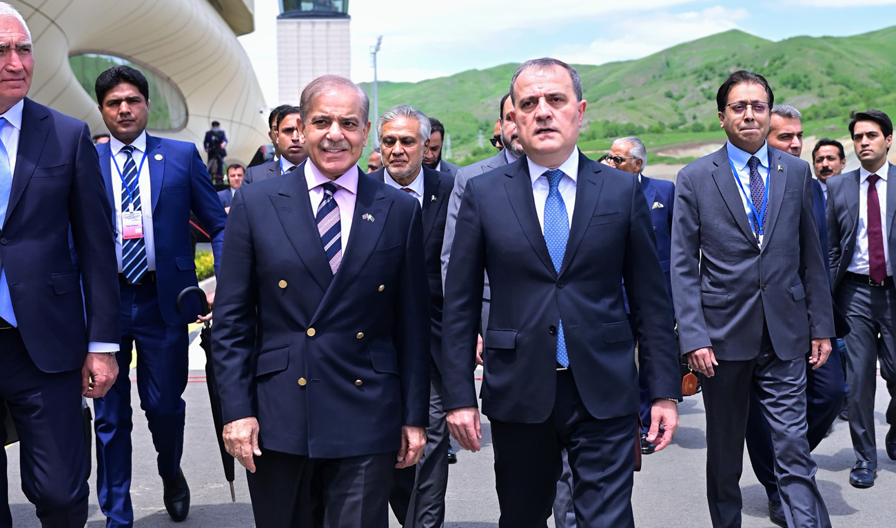 Azerbaijan’s Foreign Minister Jeyhun Bayramov welcomes Pakistan’s Prime Minister Shehbaz Sharif upon his arrival at the Lachin International Airport in Lachin, Azerbaijan on May 27, 2025, to attend the Pakistan-Türkiye-Azerbaijan trilateral summit. (Handout/PMO)