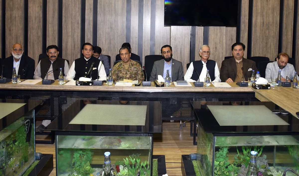 Pakistan’s Information Minister Attaullah Tarar (fourth right) and military spokesman Lt. Gen. Ahmed Sharif Chaudhry (fourth left) attends a meeting with political leaders on national security affairs in Islamabad on May 4, 2025. (Govt. of Pakistan)