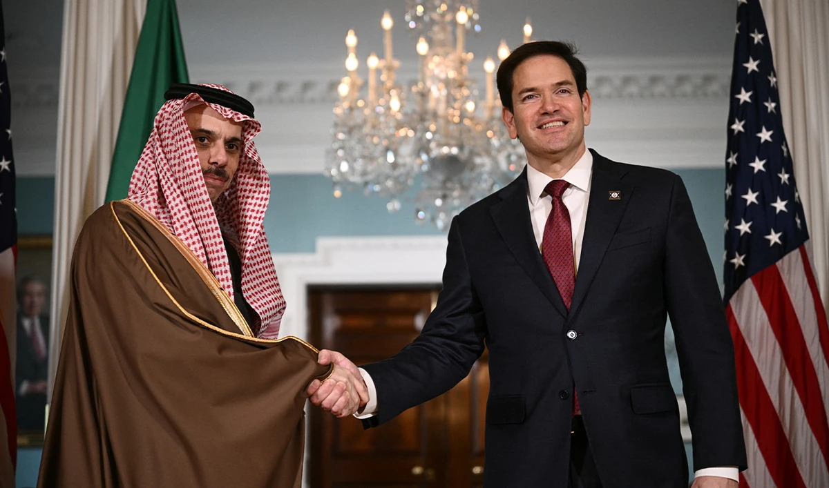 US Secretary of State Marco Rubio (R) shakes hands with Saudi Arabia's Foreign Minister Prince Faisal bin Farhan al-Saud at the State Department in Washington DC, US, on April 9, 2025. (AFP/File)