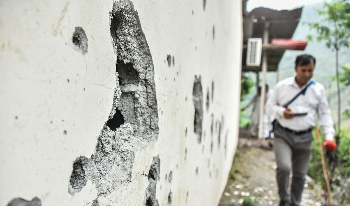 A partially damaged wall of the Neelum Jhelum Hydropower Project is pictured following Indian strikes in Nausari, about 40kms from Muzaffarabad, the capital of Azad Kashmir, on May 8, 2025. (AFP)