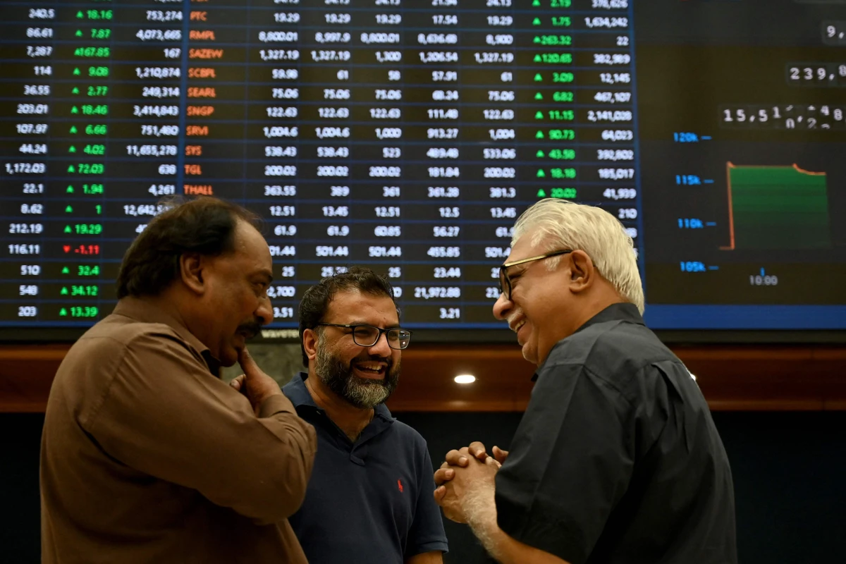 Stockbrokers interact during a trading session at the Pakistan Stock Exchange (PSX) in Karachi on May 12, 2025. (AFP)