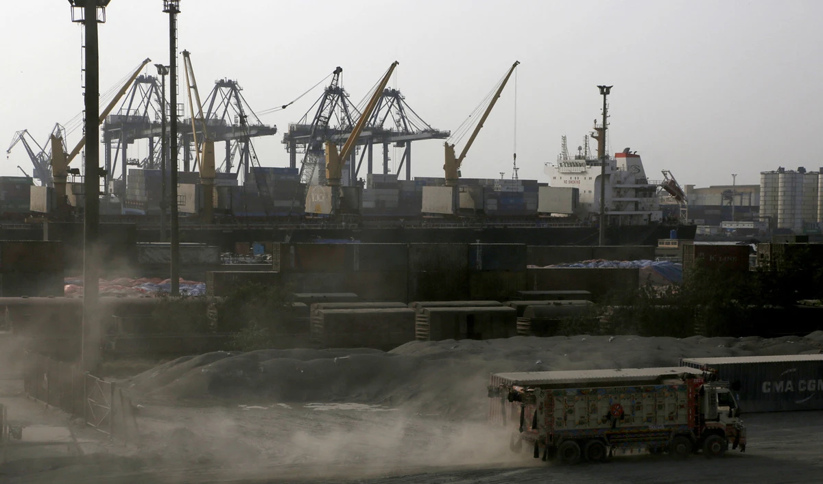 A truck moves past cranes during a media tour of the Karachi Port, Pakistan on May 9, 2025. (REUTERS)