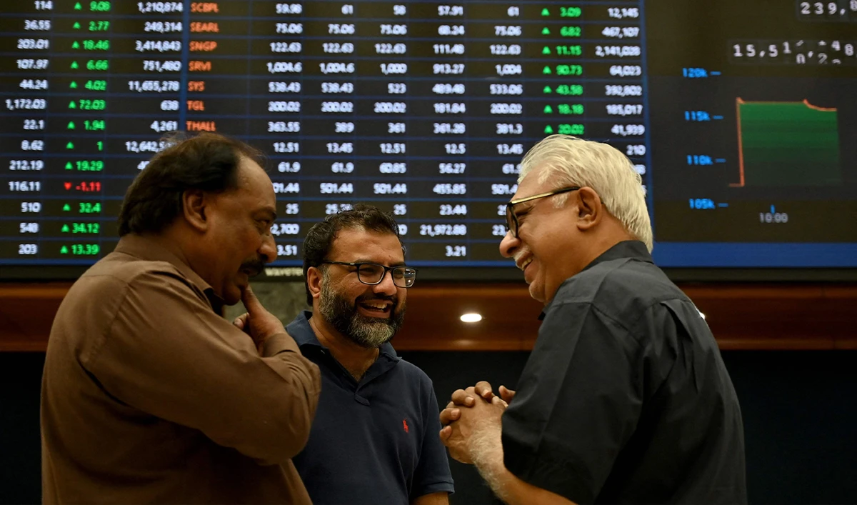 Stockbrokers interact during a trading session at the Pakistan Stock Exchange (PSX) in Karachi on May 12, 2025. (AFP/File)
