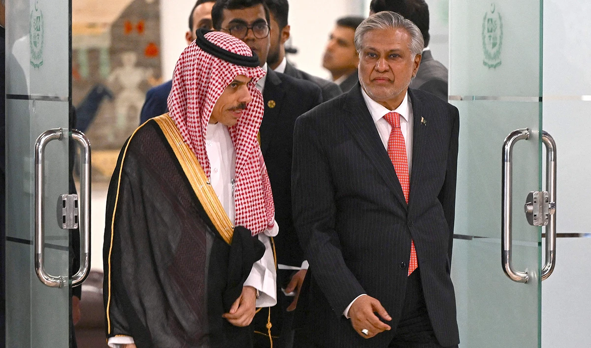 In this file photo, taken on April 16, 2024, Saudi Foreign Minister Prince Faisal bin Farhan (L) and his Pakistani counterpart Ishaq Dar arrive to address a joint press conference at the foreign ministry in Islamabad. (AFP/File)