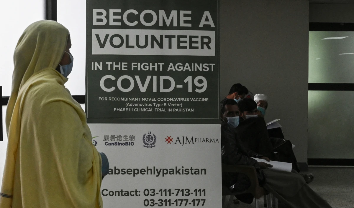 In this picture taken on November 25, 2020 volunteers wait to be administered the new Chinese-made vaccine for the Covid-19 coronavirus, the first ever Phase 3 clinical trial for any vaccine in Pakistan, at a hospital in Islamabad. (AFP/ file)