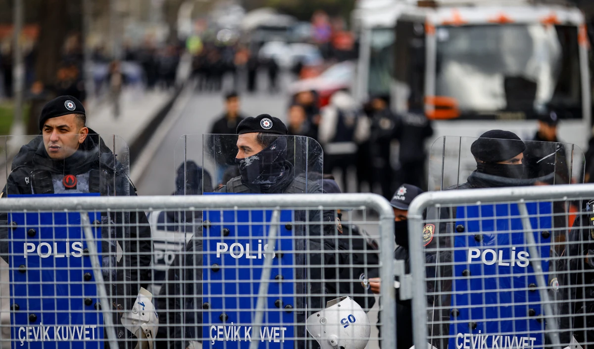Police officers stand in a street around the provincial police headquarters where Istanbul Mayor Ekrem Imamoglu is being held after his arrest, on March 19, 2025. (AFP/ file)