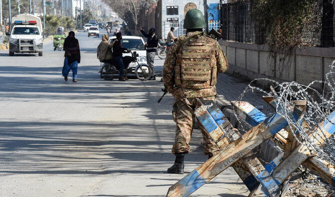 A Pakistani army personnel stands guard along a road in Quetta, Pakistan, on February 7, 2024. (AFP/File)