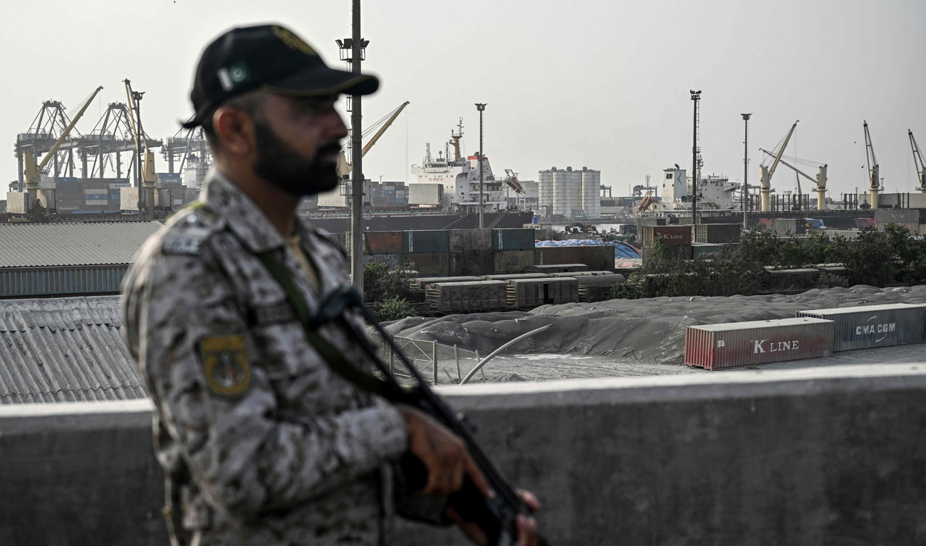 A security personnel stands guard near the Karachi Port in Karachi on May 9, 2025. (AFP/File)