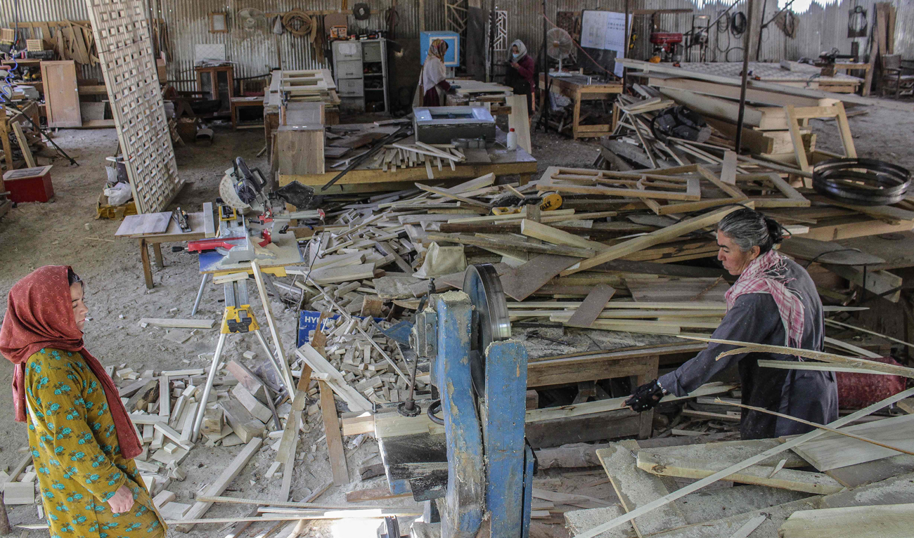 In this photograph taken on May 20, 2025, a team of women carpenters works at a carpentry workshop in Karimabad, in the Hunza district of Pakistan’s Gilgit-Baltistan region. (AFP)