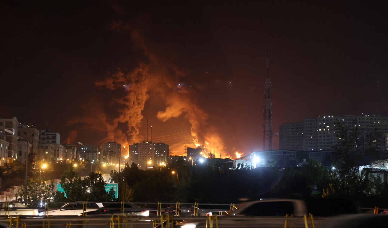 Smoke from an Israeli attack rise from Sharan Oil depot, following Israeli strikes on Iran, in Tehran, Iran, June 15, 2025. (Reuters)