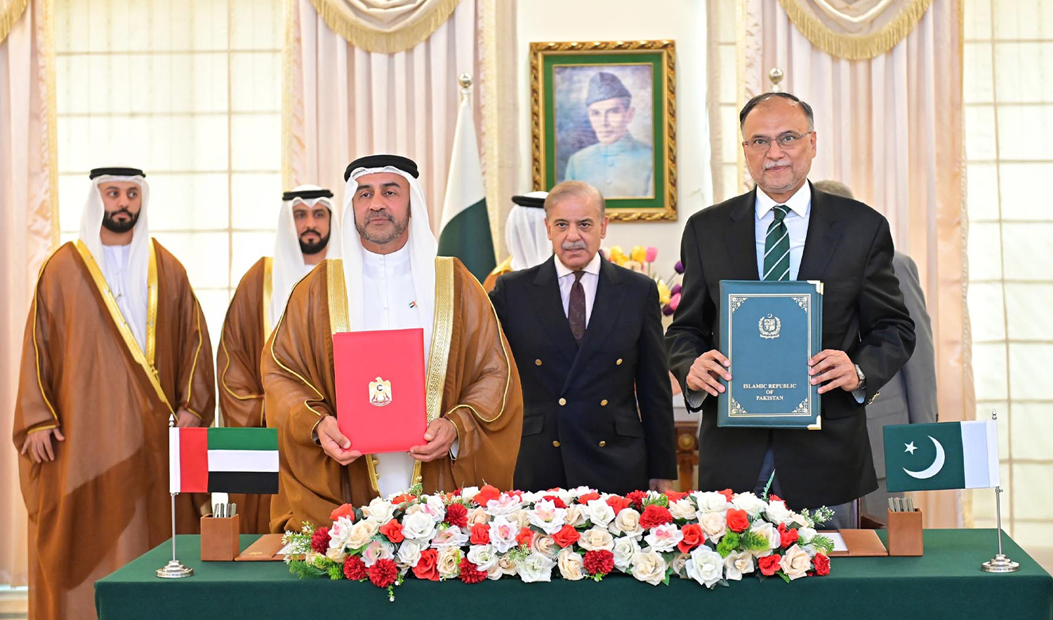 UA's Deputy Minister For Competitiveness and Knowledge Exchange, Abdulla Nasser Lootah (left), and Pakistan’s Planning Minister Ahsan Iqbal (right) pose for a picture in Islamabad, Pakistan, on June 17, 2025, after signing an memorandum of understanding to share knowledge and expertise in various sectors. (PID)