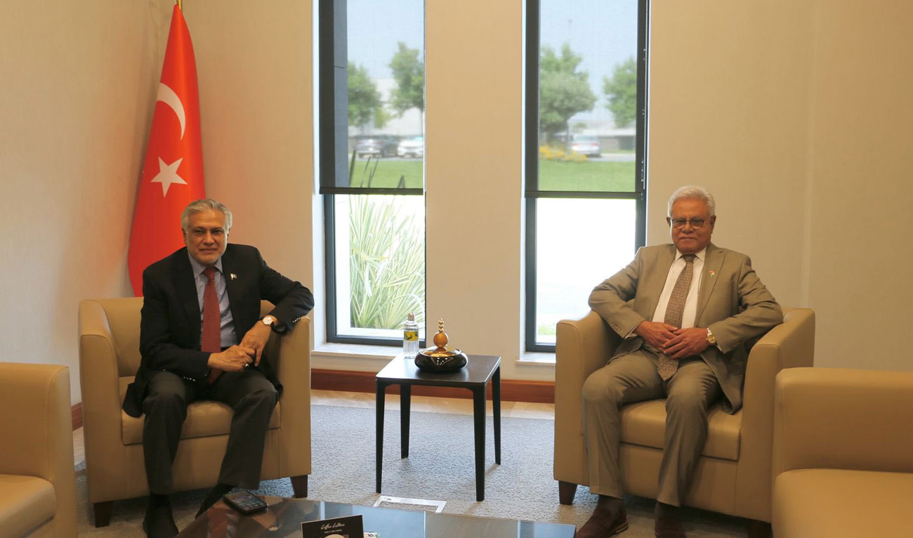 Pakistan's Deputy Prime Minister and Foreign Minister, Ishaq Dar (left) with Pakistan’s Ambassador to Turkiye, Dr. Yousaf Junaid (right) upon his arrival in Turkiye to attend Organization of Islamic Cooperation (OIC) Council of Foreign Ministers, on June 20, 2025. (@ForeignOfficePk/X)
