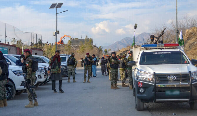 Frontier Constabulary and army personnel gather near the ambushed region in district Kurram, Pakistan, on January 17, 2025. (AFP/File)