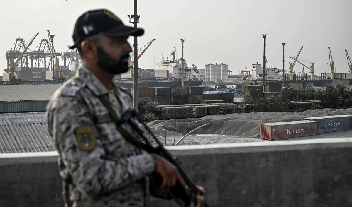 A security personnel stands guard near the Karachi Port in Karachi on May 9, 2025. (AFP/File)