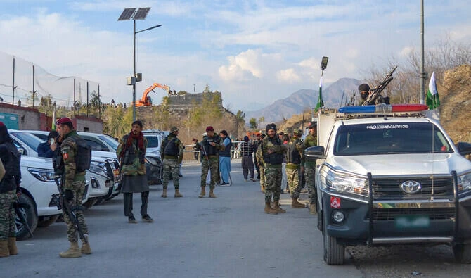 Frontier Constabulary and army personnel gather near the ambushed region in district Kurram, Pakistan, on January 17, 2025. (AFP/File)