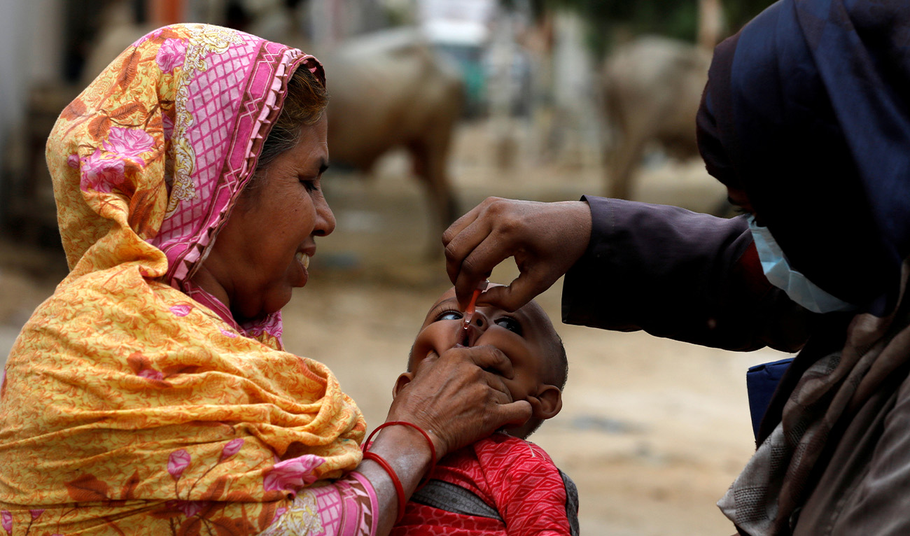 A boy receives polio vaccine drops, during an anti-polio campaign in Karachi, Pakistan, on July 20, 2020. (Reuters/File)