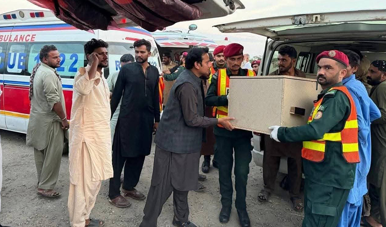 Rescue workers carry the coffin of a victim killed in a militant attack in Dera Ghazi Khan on July 11, 2025. (Photo courtesy of Rescue 1122)