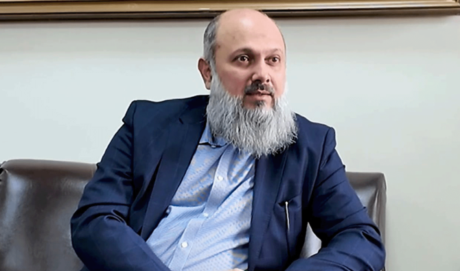 In a handout photo by Government of Pakistan on June 12, 2025, Commerce Minister, Jam Kamal Khan in conversation with Federal Minister for Information Technology and Telecommunication, Shaza Fatima Khawaja (not in picture) in Islamabad. (AFP/ file)
