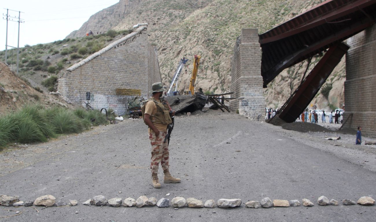 A paramilitary soldier stands on a road, as restoration works go on at damaged railway tracks, a day after separatist militants conducted deadly attacks, in Bolan district of Pakistan's restive province of Balochistan, Pakistan, on August 27, 2024. (REUTERS/ File)
